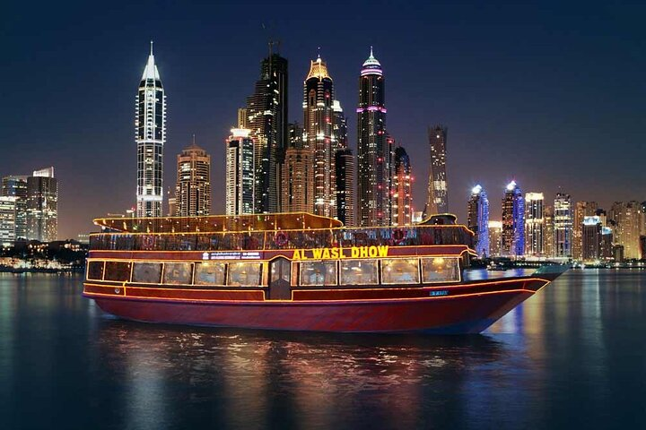 Experience a delightful dinner on the Dhow Cruise surrounded by Dubai Marina's stunning skyline while enjoying a feast of Middle-Eastern and Asian flavors. Perfect for a memorable evening!